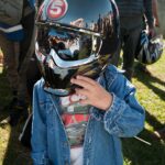 Young man in-helmet, thanks to a Level 5 Motorsports crew member