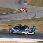 Lotus Evora, car 65, enters turn 5